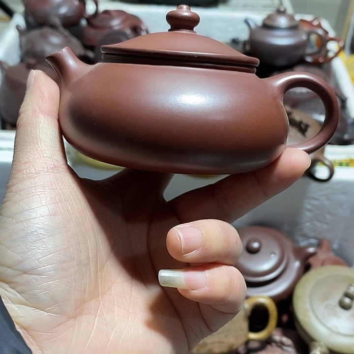 紫砂茶壶微瑕微笑