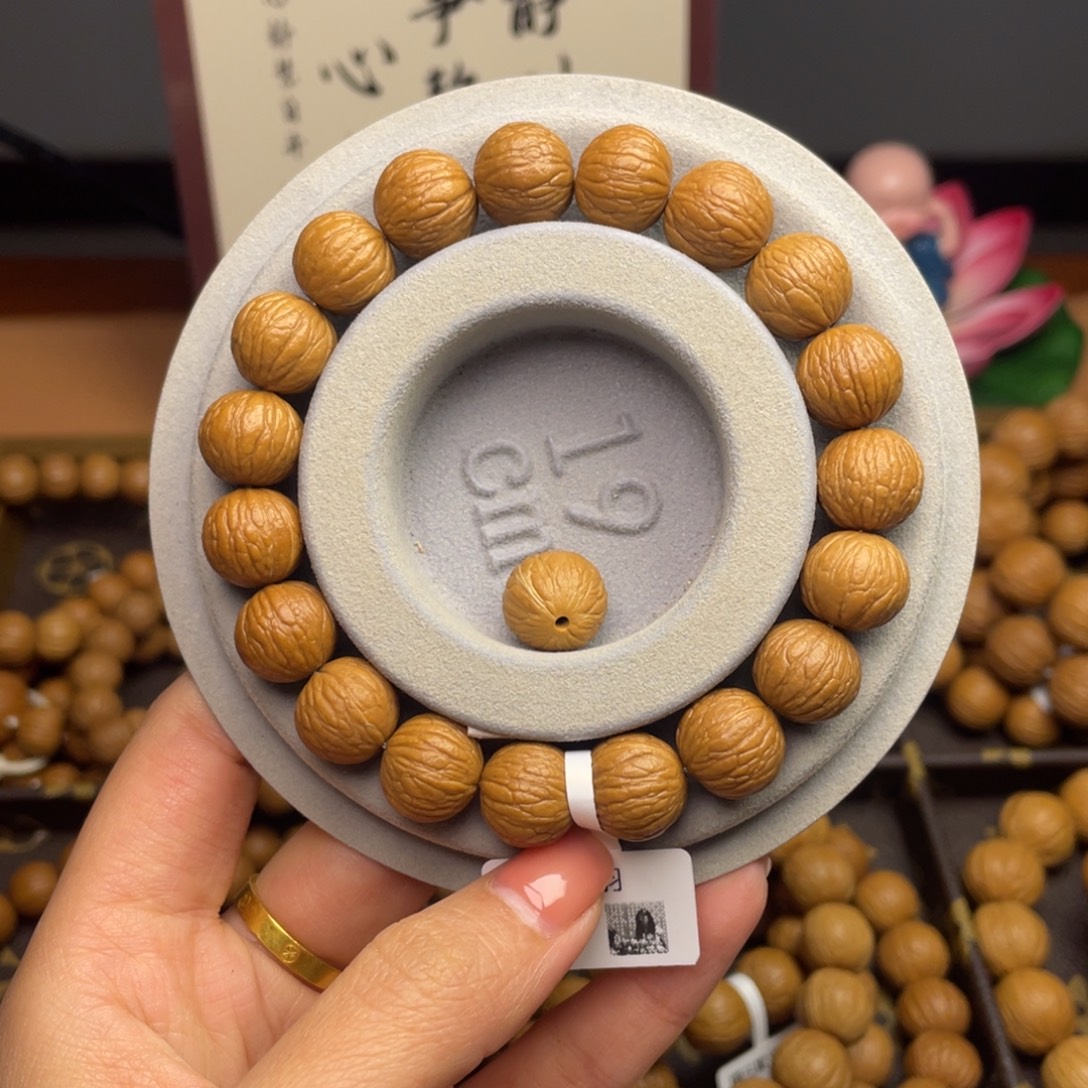 遇***圆猴头核桃手串12凤羽