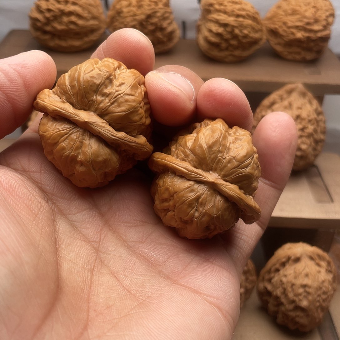 吊坠桃核哈摸头双开背