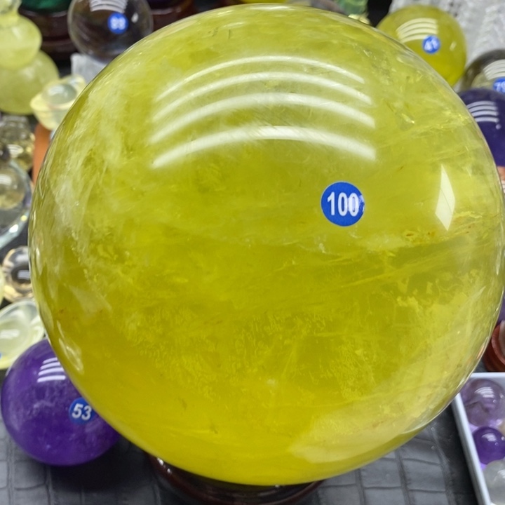 用***7石材天然黄水晶球