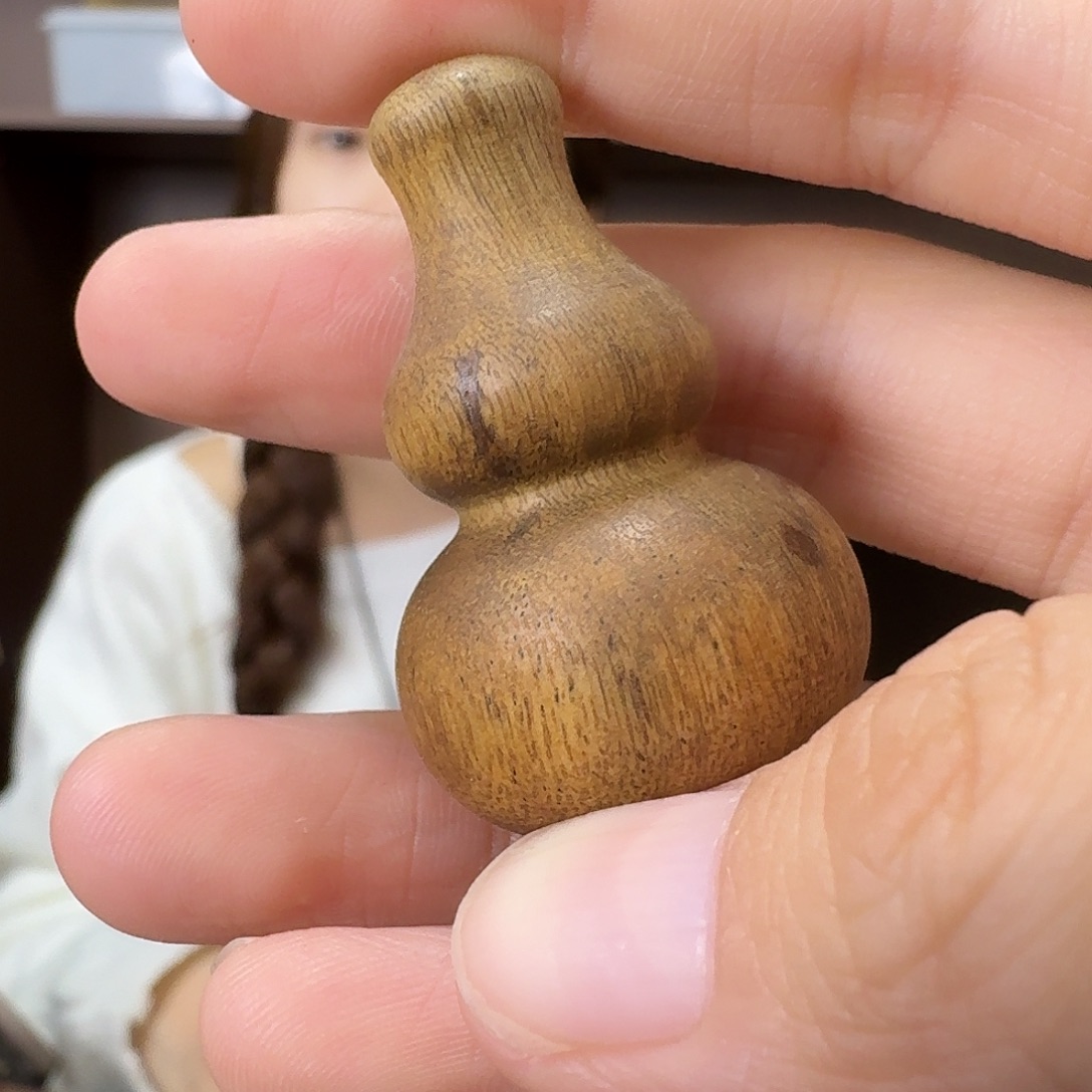 手把件沉香达拉干树心油葫芦手把件