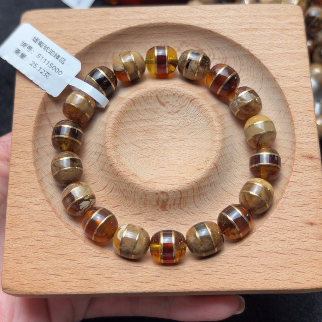 兆***琥珀合金珠宝奇石10mm双弦溶洞