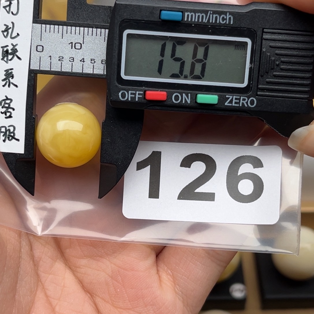 蜜蜡裸石未镶嵌不****?蜜蜡