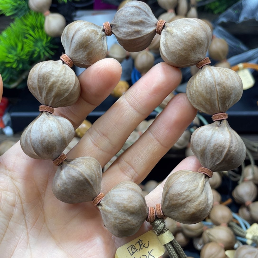 晋***）橄榄核吊坠2625四花铁核
