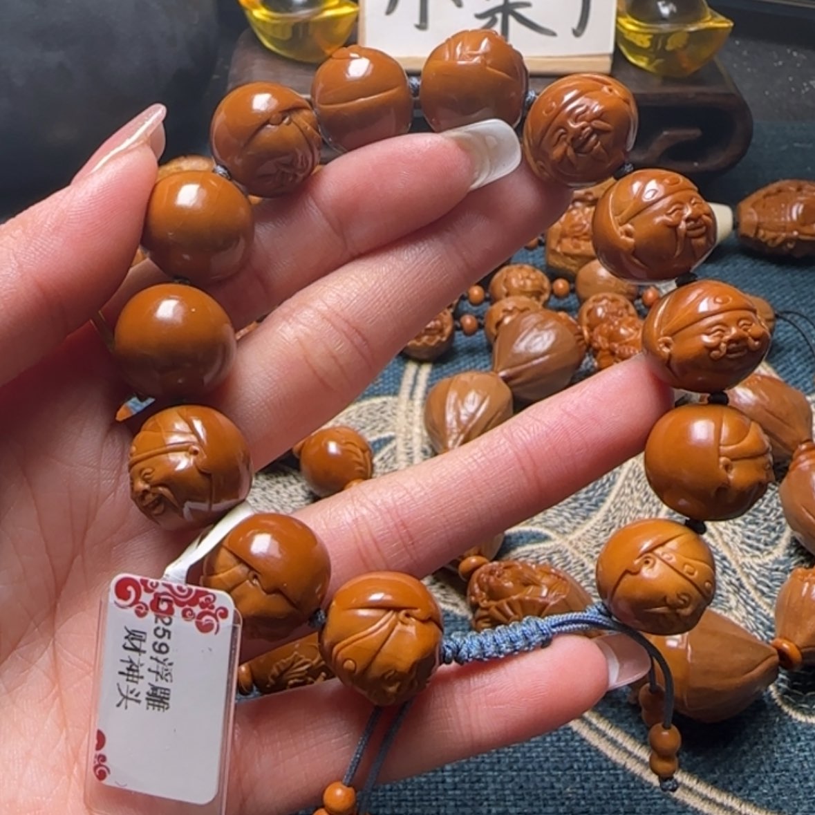 【闪购商品】橄榄核手串浮雕财神头