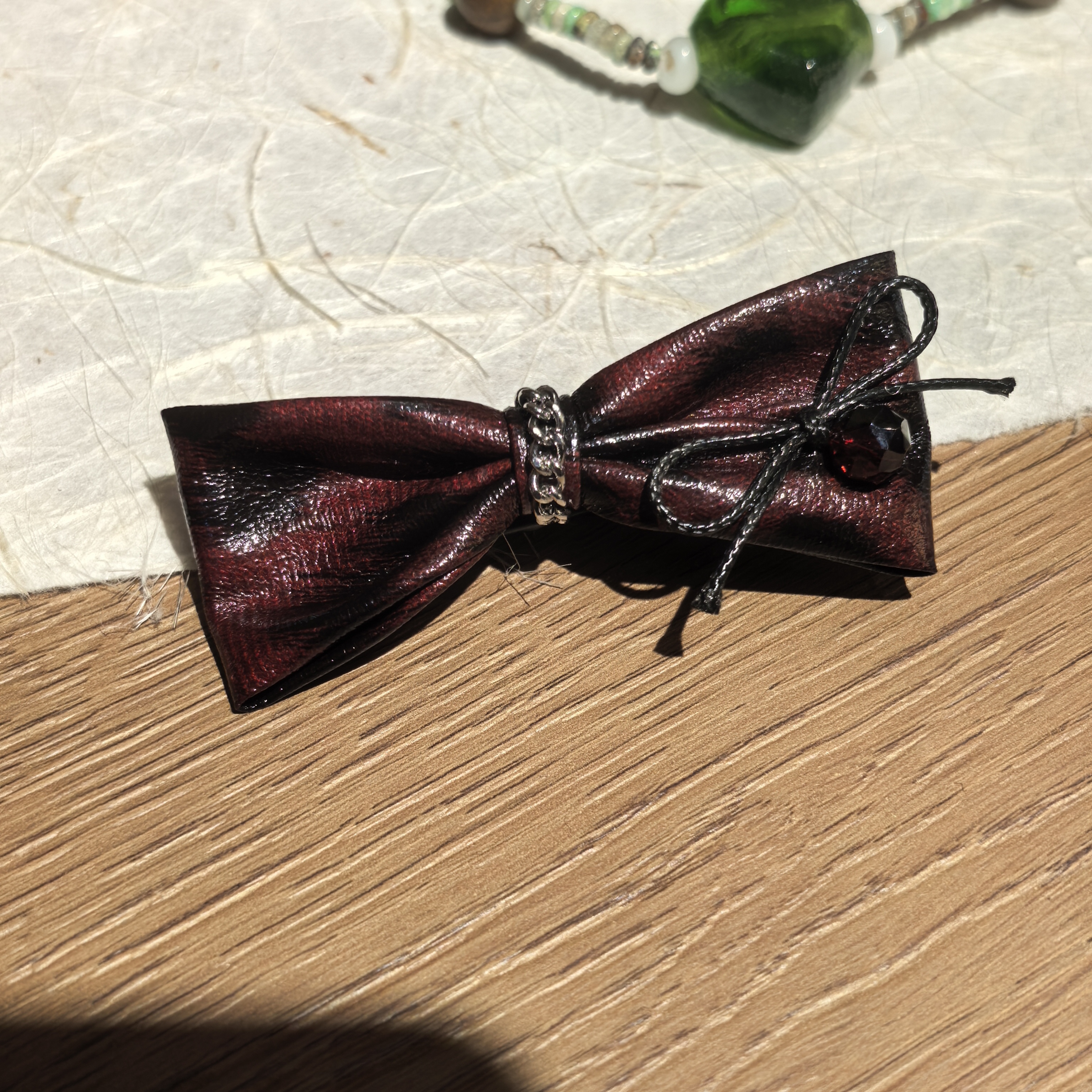 D204红色皮皮豹纹蝴蝶结链条边夹