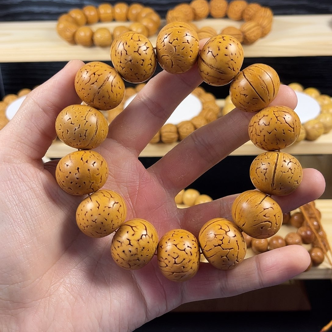 奔***界吊坠桃核东北桃核黄皮大尺寸苹果园光珠