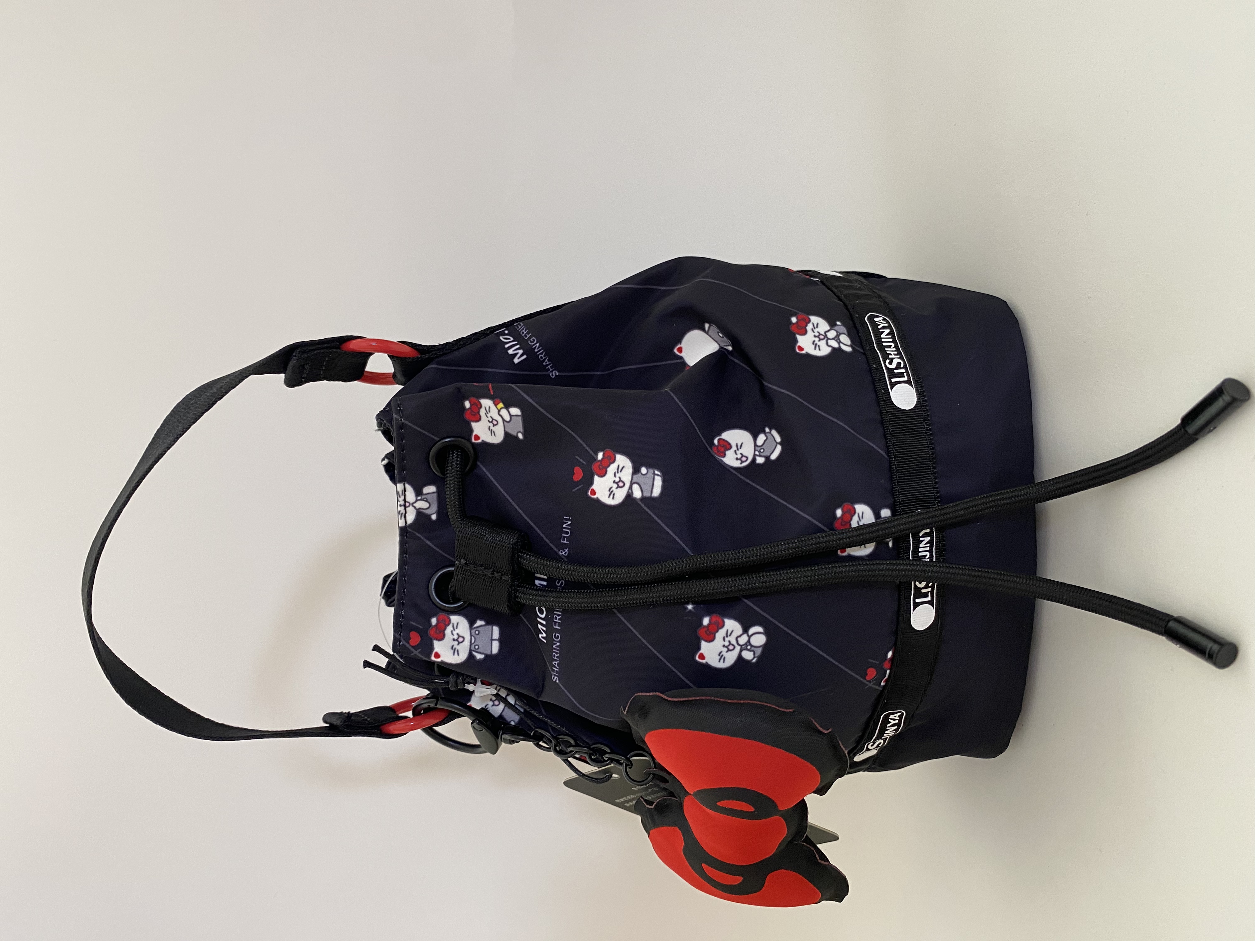 可爱蝴蝶结猫咪卡通女包斜挎单肩手提水桶休闲包417