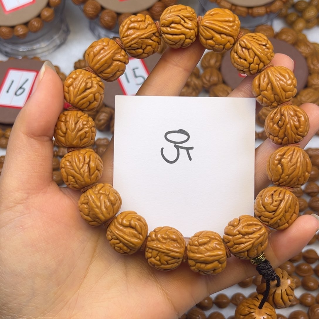 核桃嘻**啦龙纹桃核手串肚卡17霸王龙