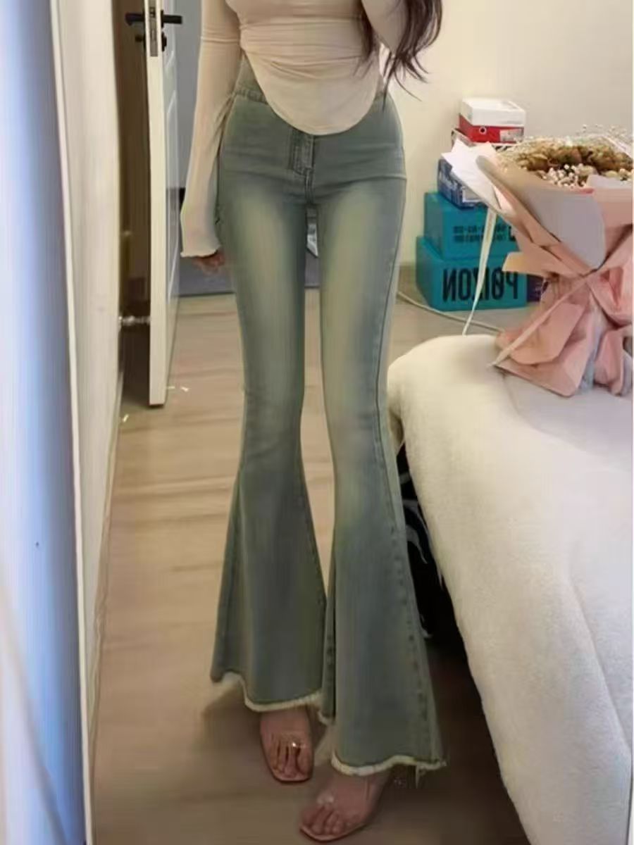高腰毛边牛仔裤女2025年冬季加绒修身显高显瘦弹力鱼尾喇叭裤