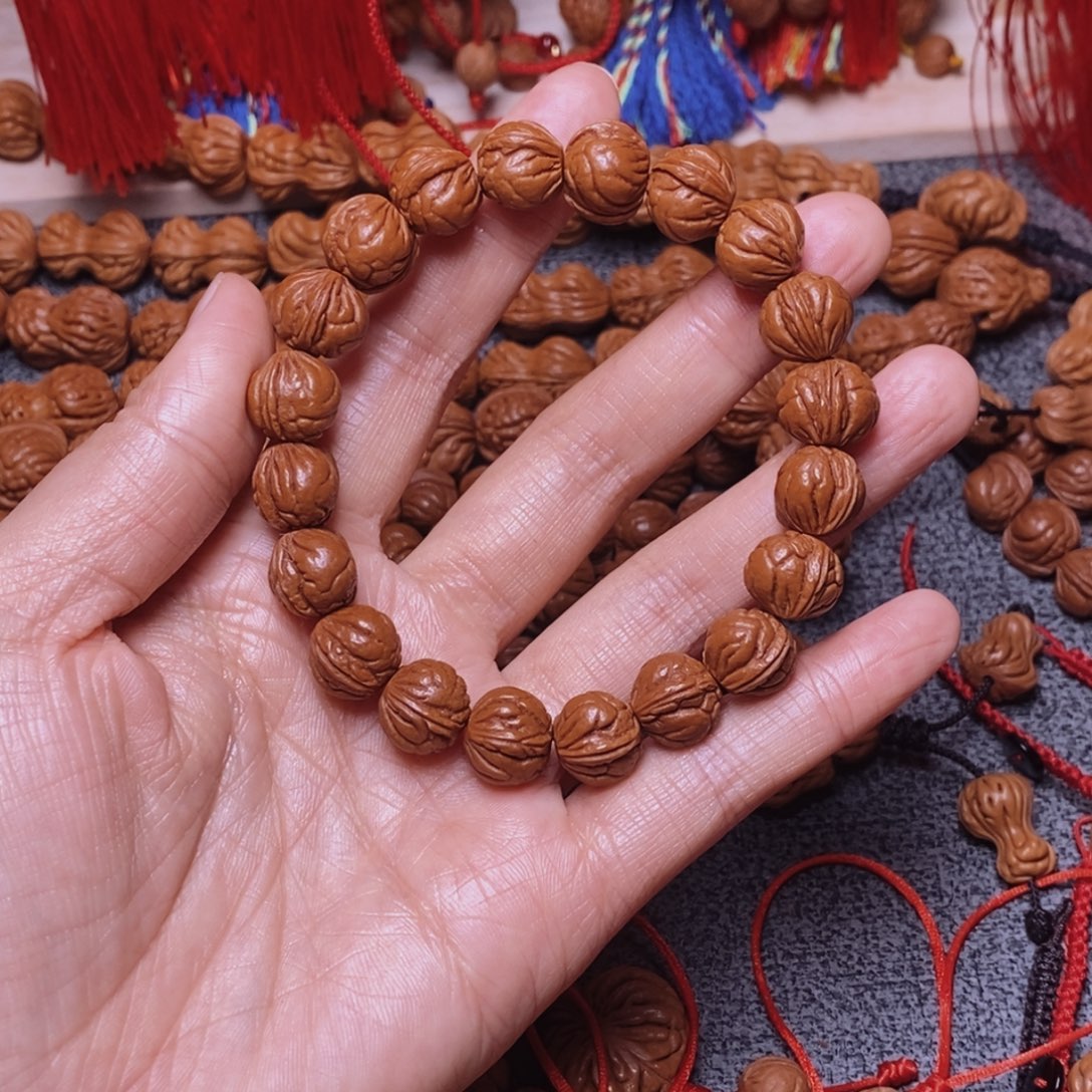 吊坠桃核桃枭手串