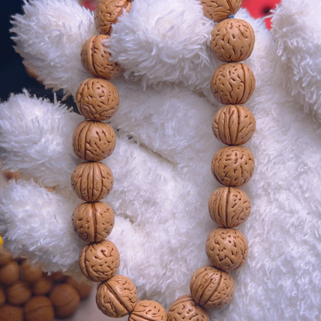 桃核手串肥脐三道金手持