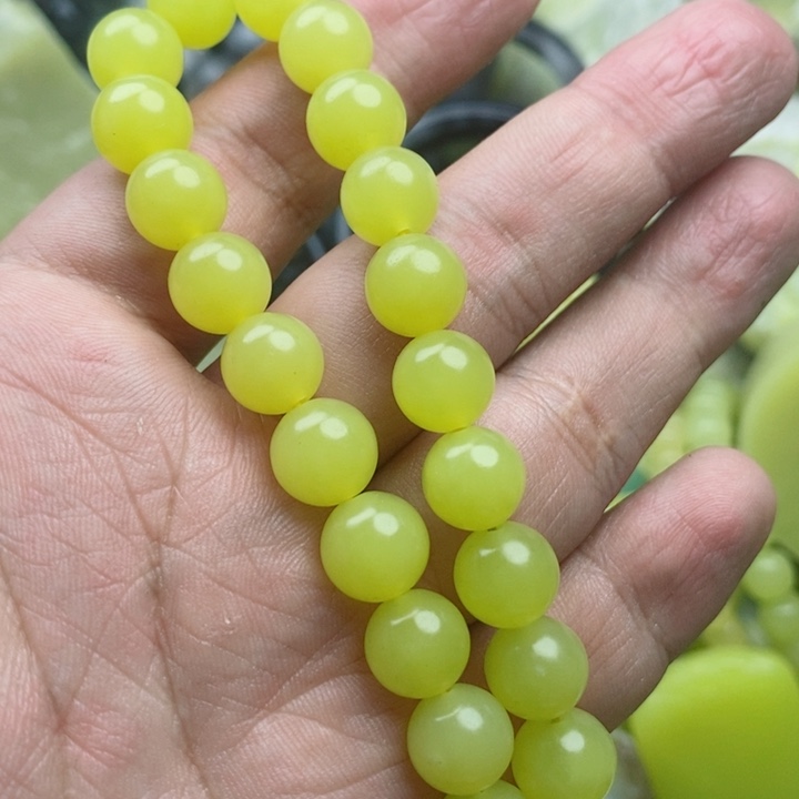 杨***铭石材新疆若羌手串卡10