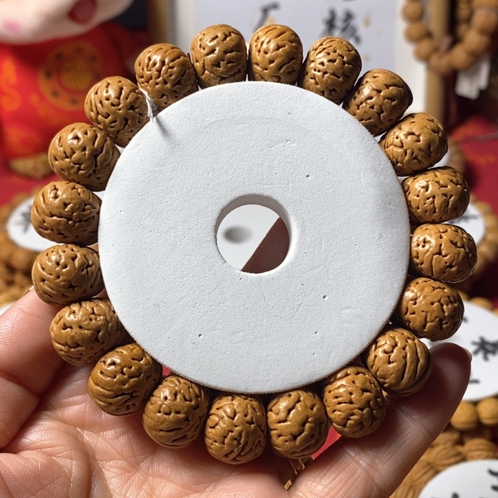 桃核手串胡*。树王纽扣16