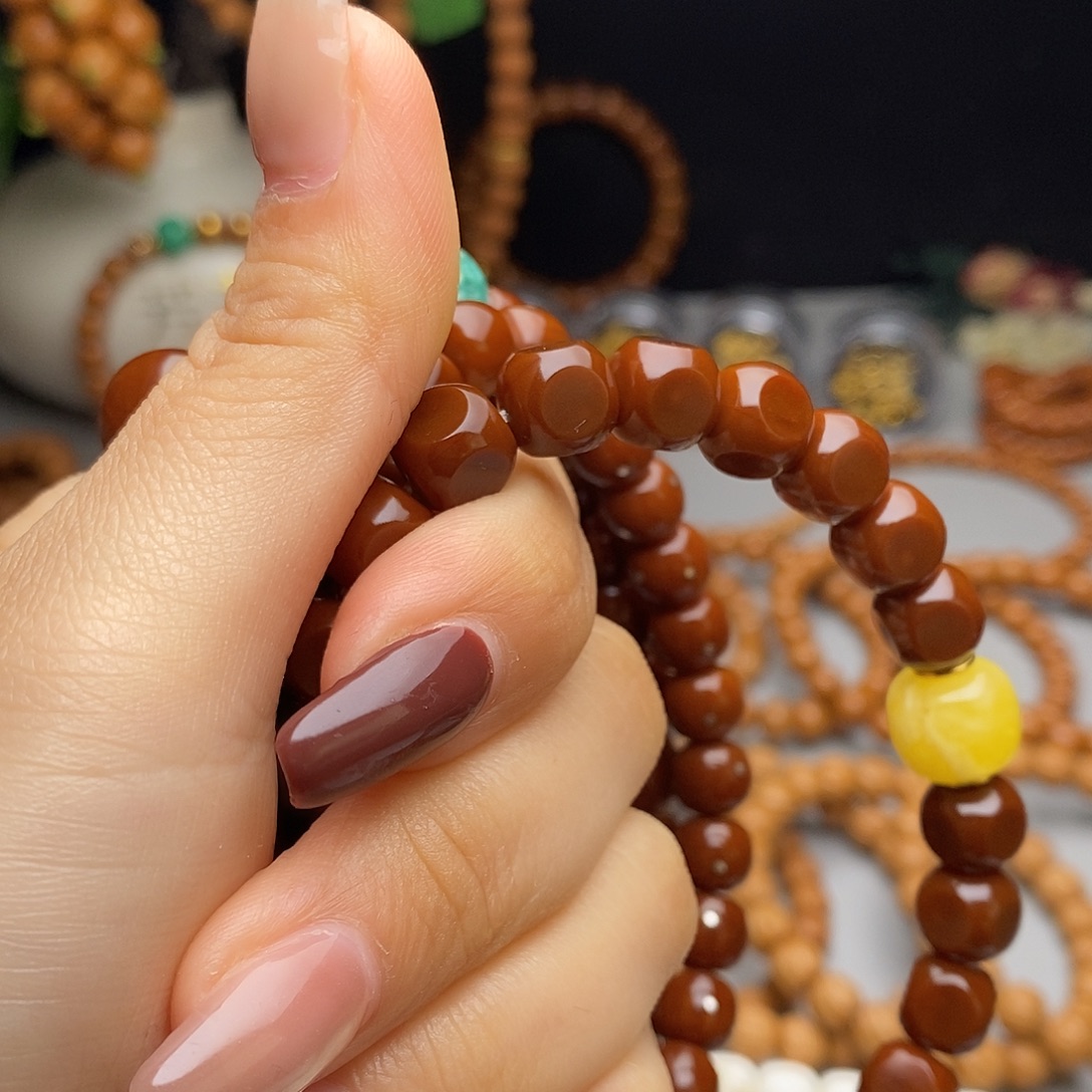 杨***白吊坠文玩核桃红串