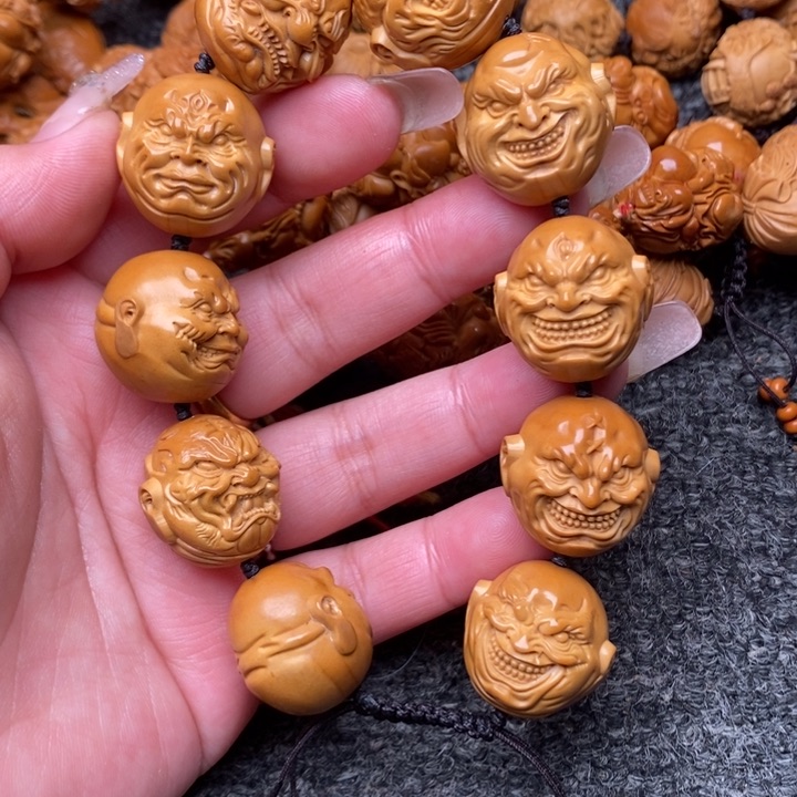 吊坠橄榄核与世界健健康康哭健健康康