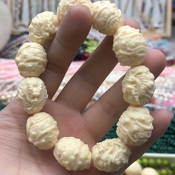 玛瑙/玉髓珠宝半成品未镶嵌象牙果雕刻龙手串