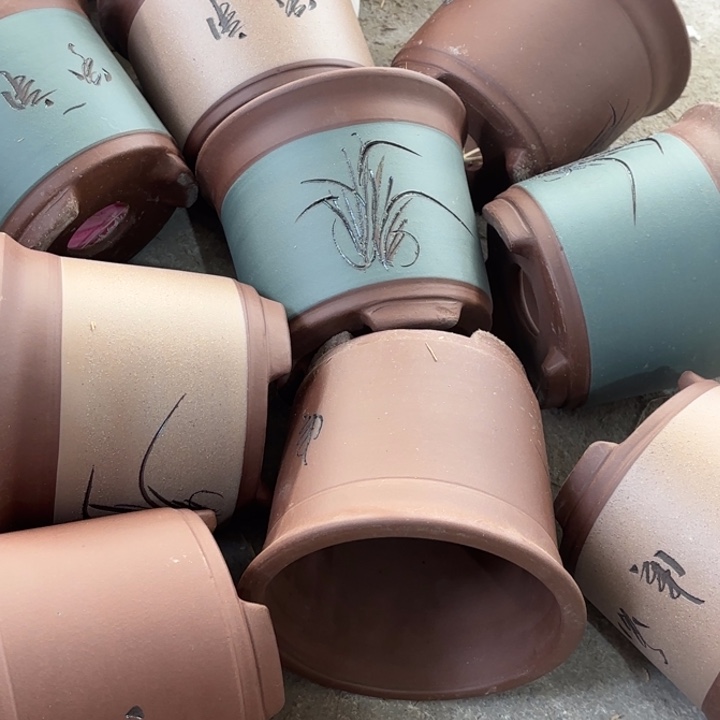 紫砂花盆100-9。                    