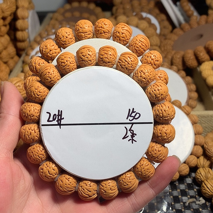 我***我手串桃核20#东北野生龙纹元宝