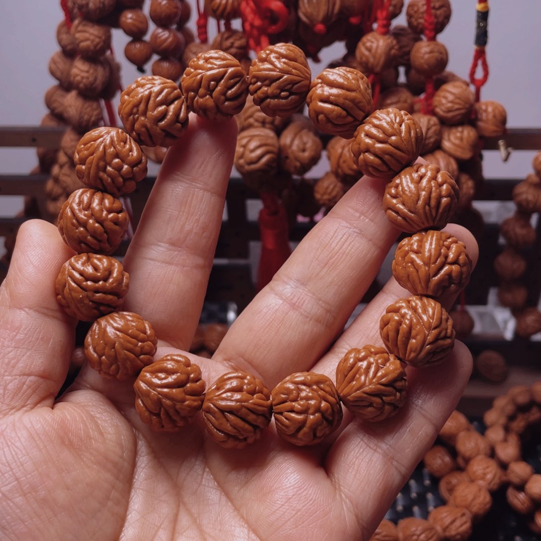 木质类龙纹桃枭手串