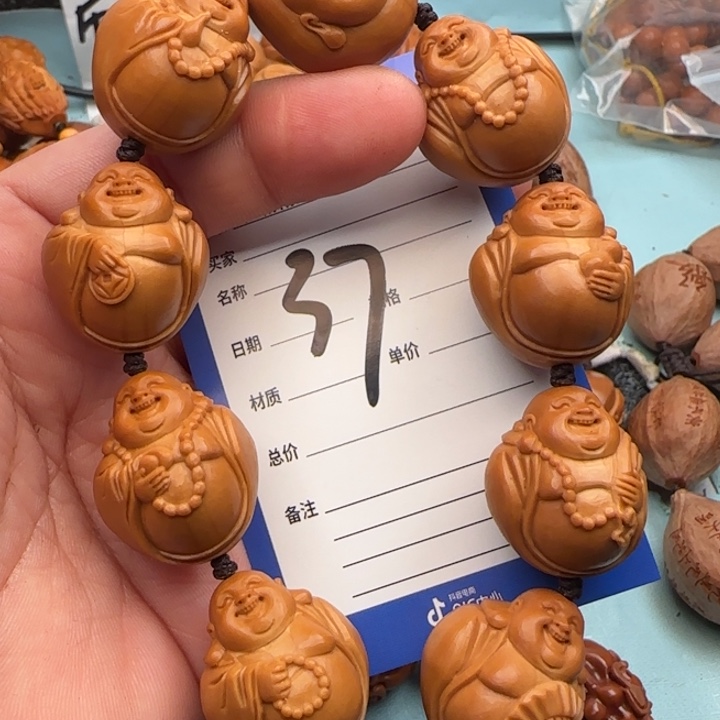 橄榄核手串M**?橄榄核雕工艺手串