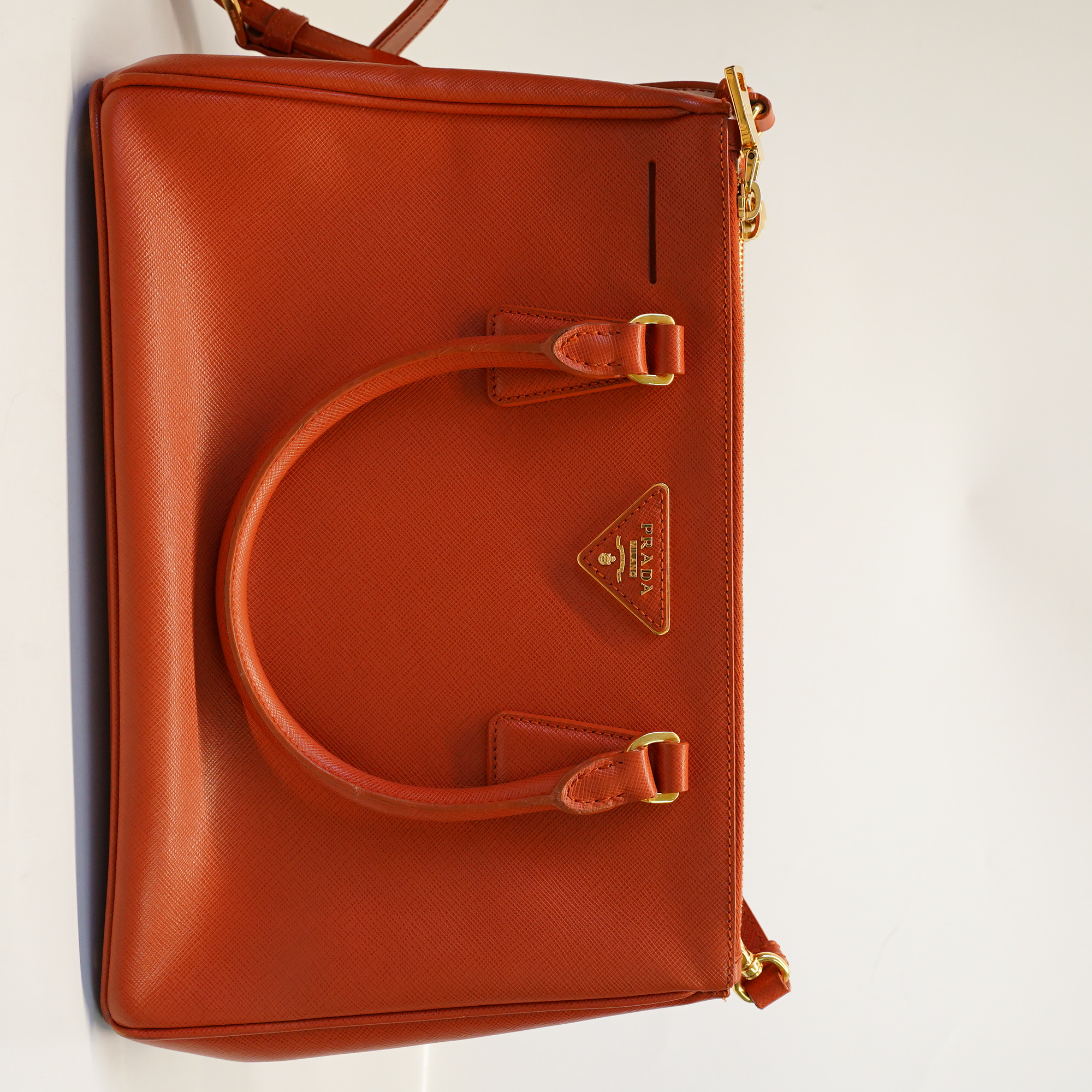 95新 Prada/普拉达 杀手包橙色/D00425