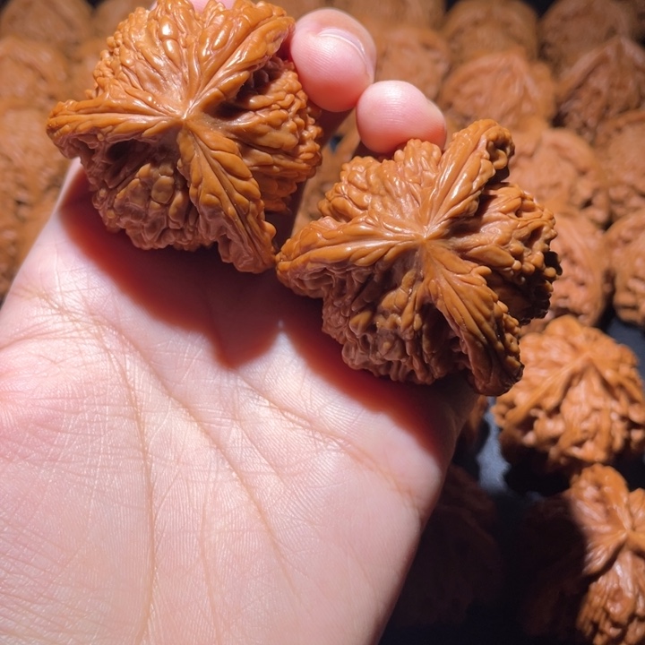 爱***柿桃核吊坠小妹三棱