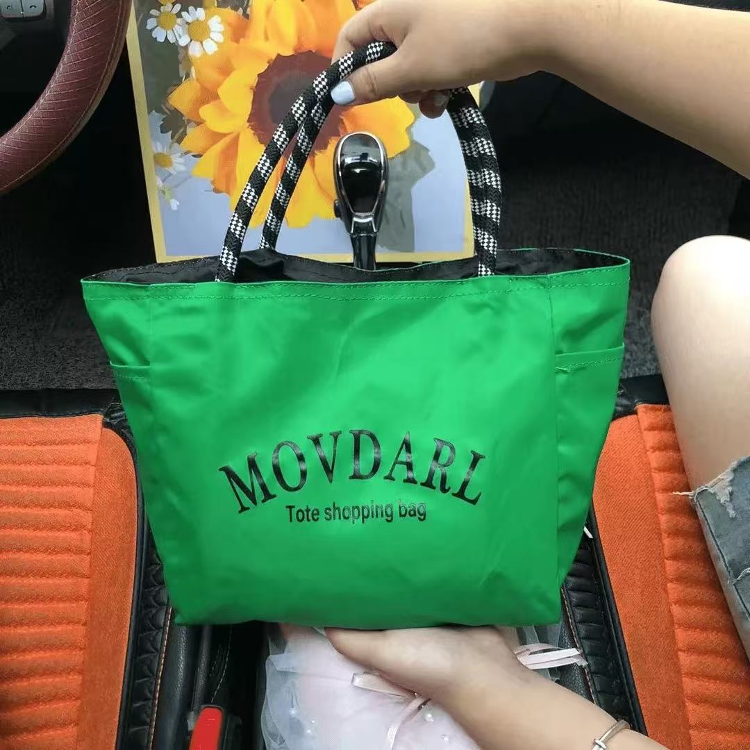 购物手提包2025年日常逛街通勤简约尼龙防水便当包俩面可用饭盒包