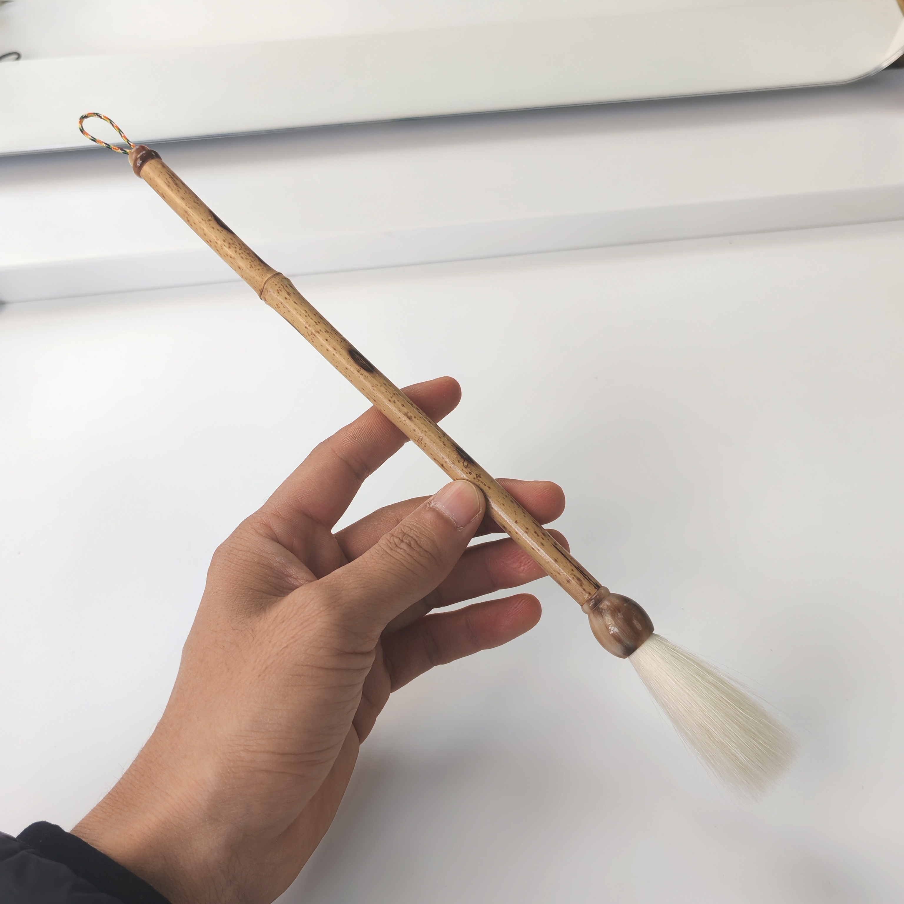 纯细嫩光峰羊毫出峰5.2口径1.0梅鹿竹牛角笔杆毛笔