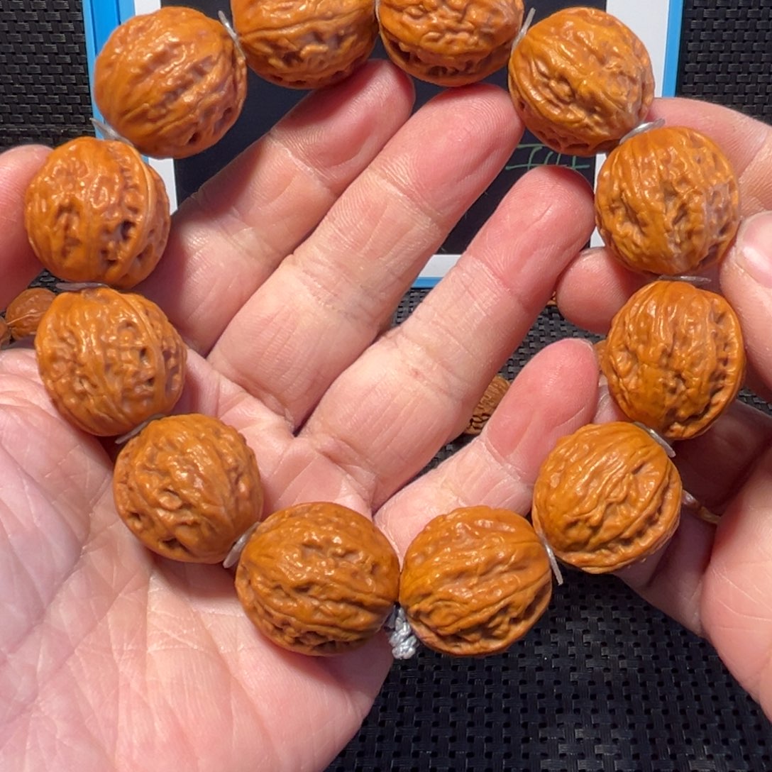 文玩核桃吊坠龙珠吗疑问粗筋21