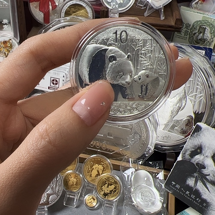 用***7纯银2011年熊猫银币 瑕疵币