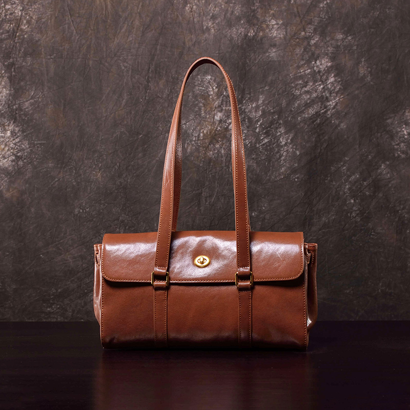 法棍包牛皮腋下包纯色水晶植鞣腋下包包盖式街头潮流锁扣欧美