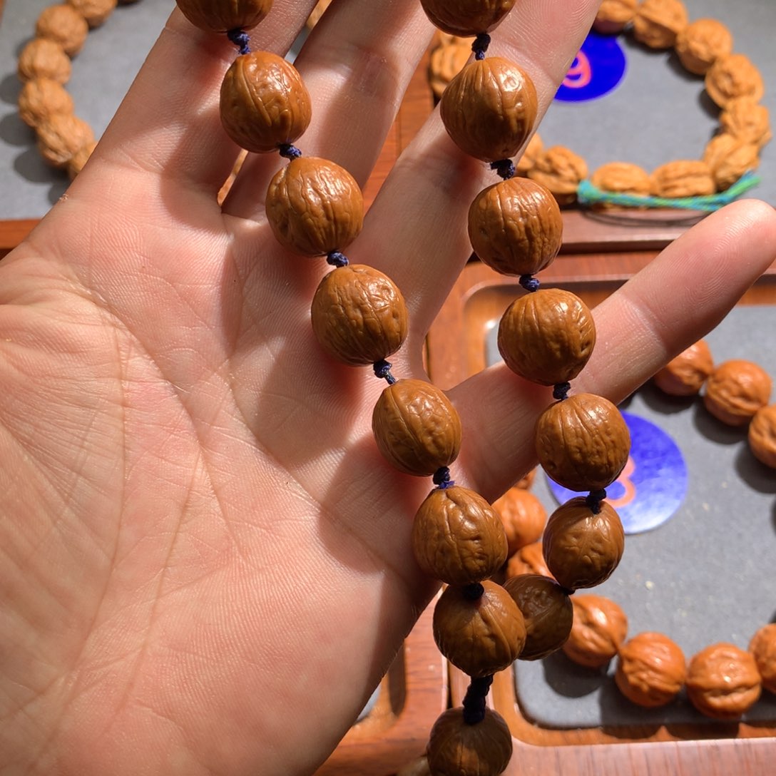 忽***滴文玩核桃手串光头