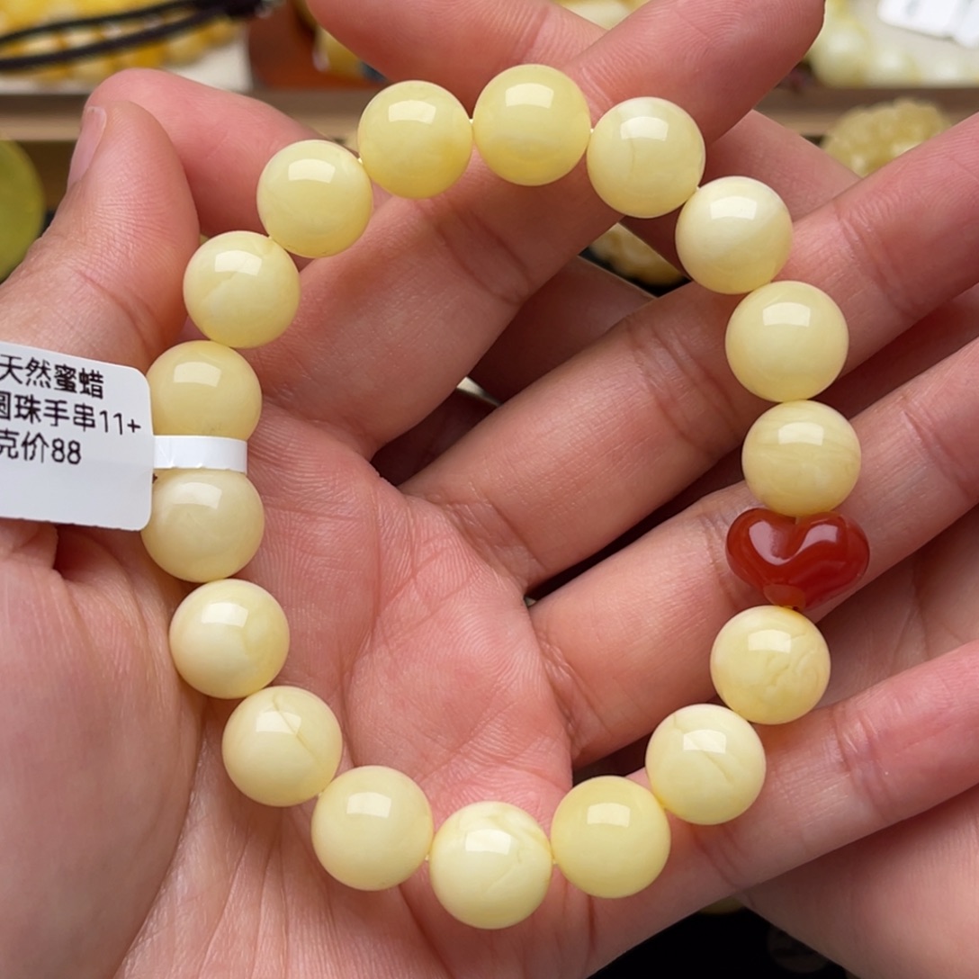 琥珀未镶嵌裸石蜜蜡手串笑