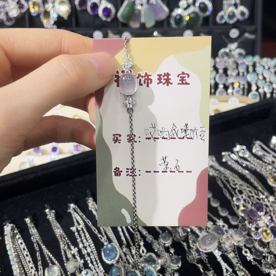 哎****银S925镶嵌烟晶手链手链