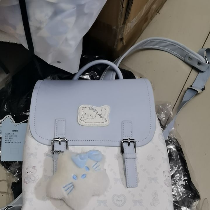 挂脖款蓝色双肩背包