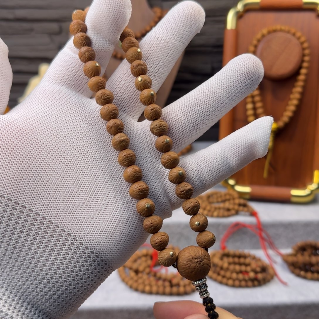 凤眼菩提吊坠镶嵌手持