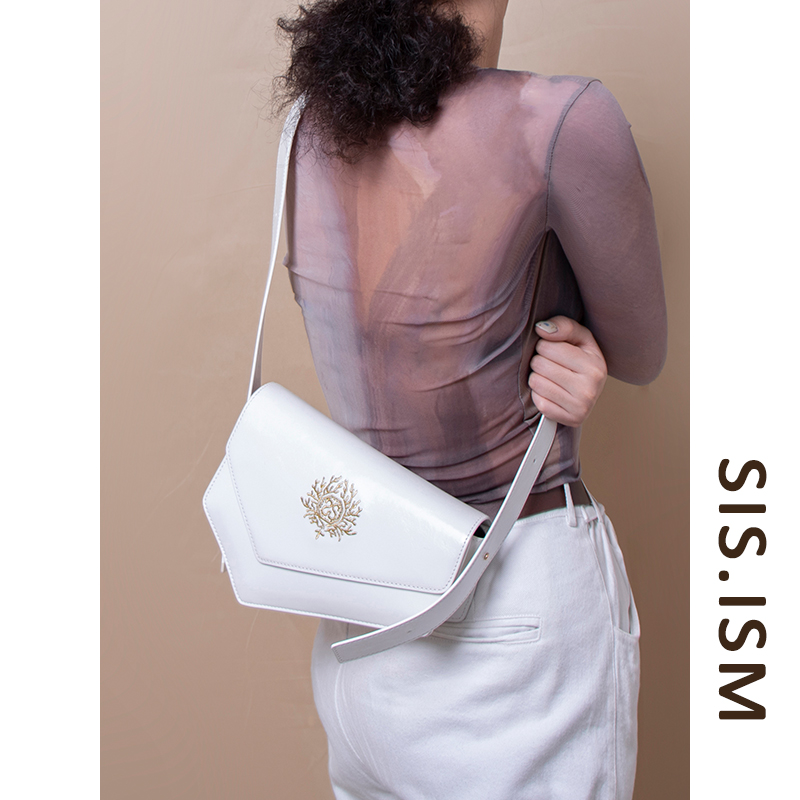 SISISM/姐妹主义云角包不规则形单肩斜挎包时尚百搭小众牛皮胸包