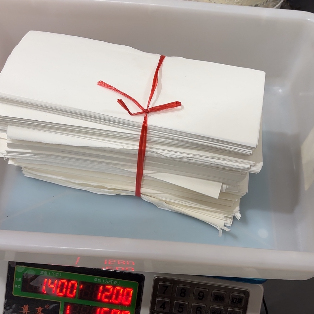 白色机器纸边边10*27cm 1.4kg