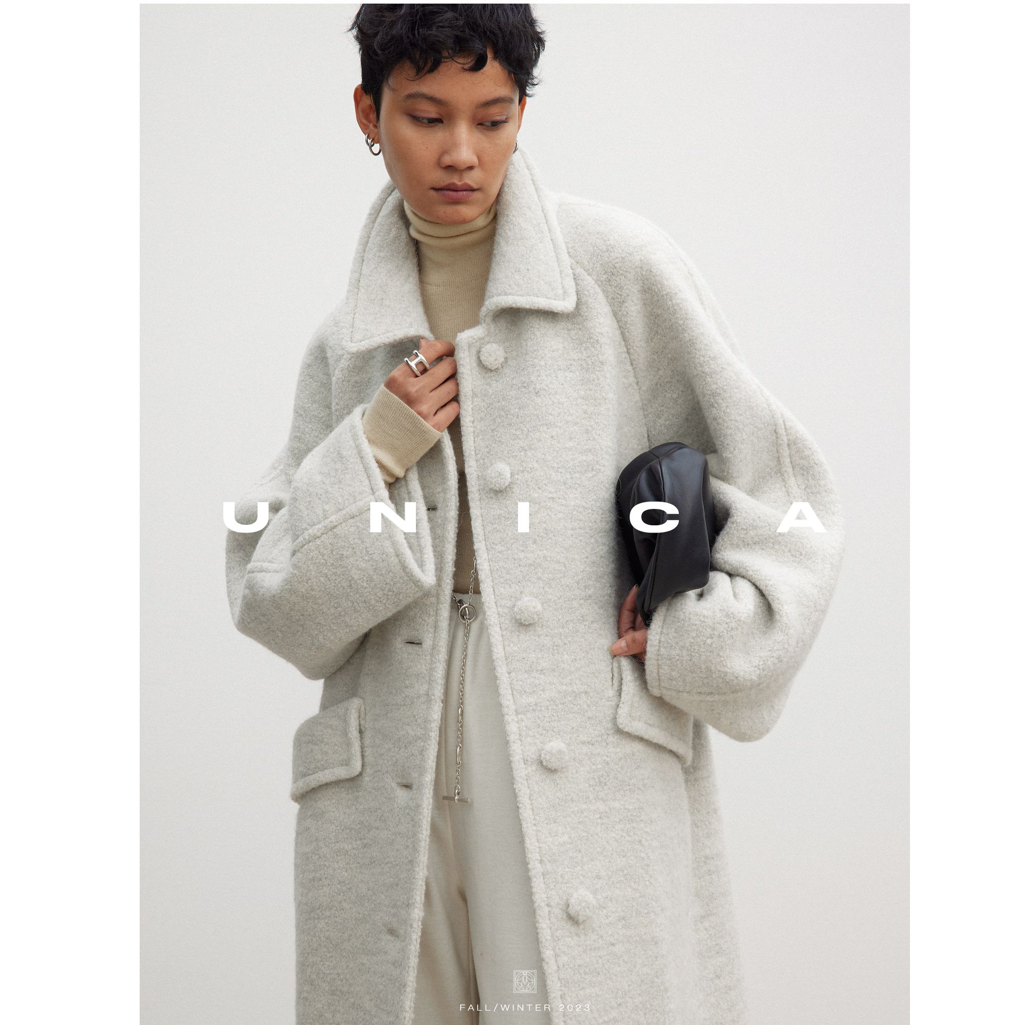 UNICA/云朵感超柔混色圈圈羊驼_减龄百搭小翻领2用口袋中长大衣