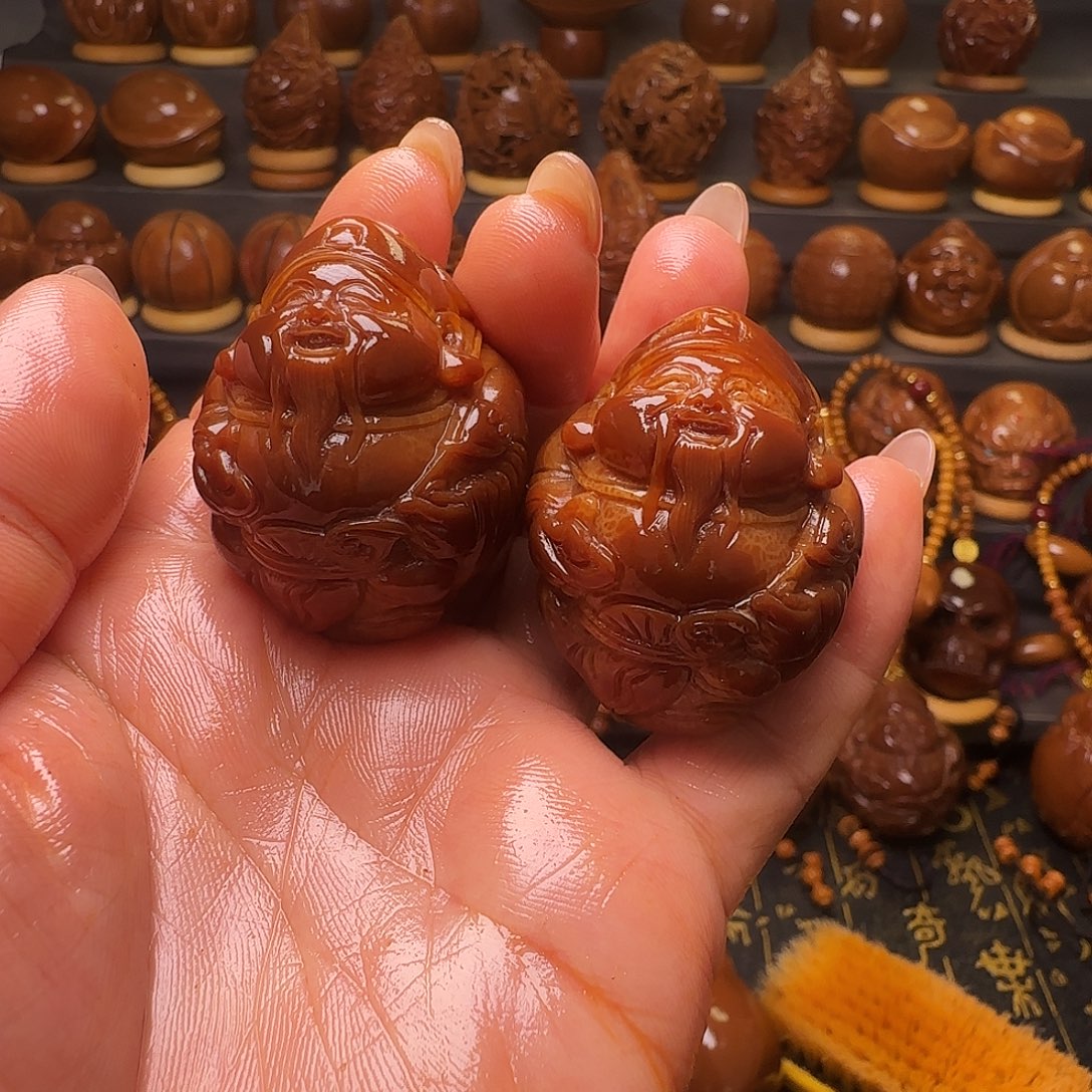 ^***_橄榄核手串/手链财神玉华