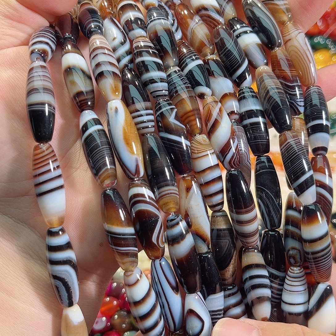 玛瑙/玉髓未镶嵌珠宝半成品蚕丝玛瑙天珠一天10x30mm