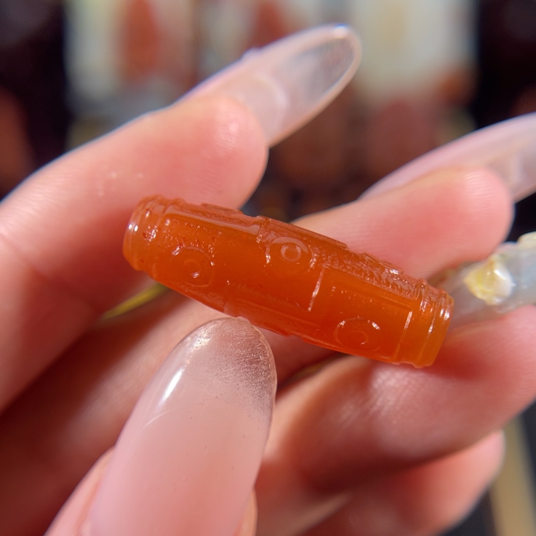 南红玛瑙大黑洞九眼27.5*9未镶嵌