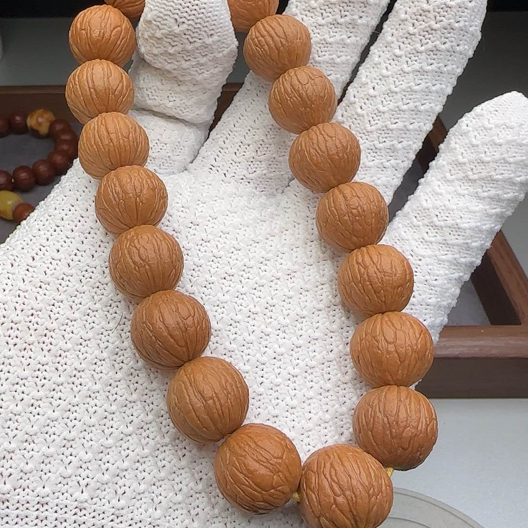 猴头核桃手串毕业凤羽手持