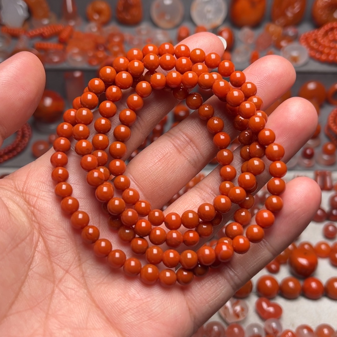 一***月南红玛瑙未镶嵌多圈柿子红5➕m，31.9克，以证书克重为准