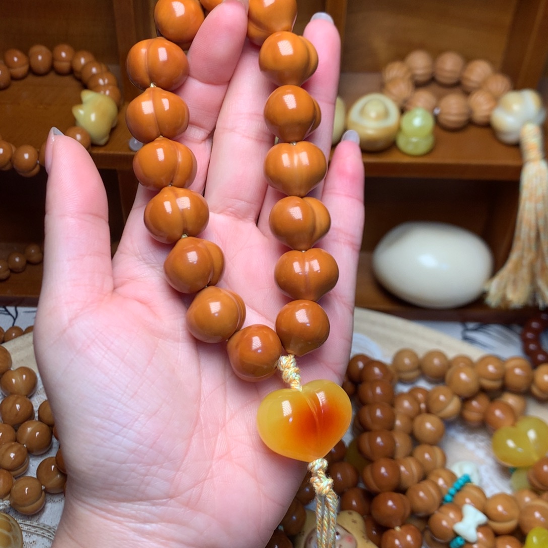 猴头核桃把件17玻璃底屁桃手持爱心