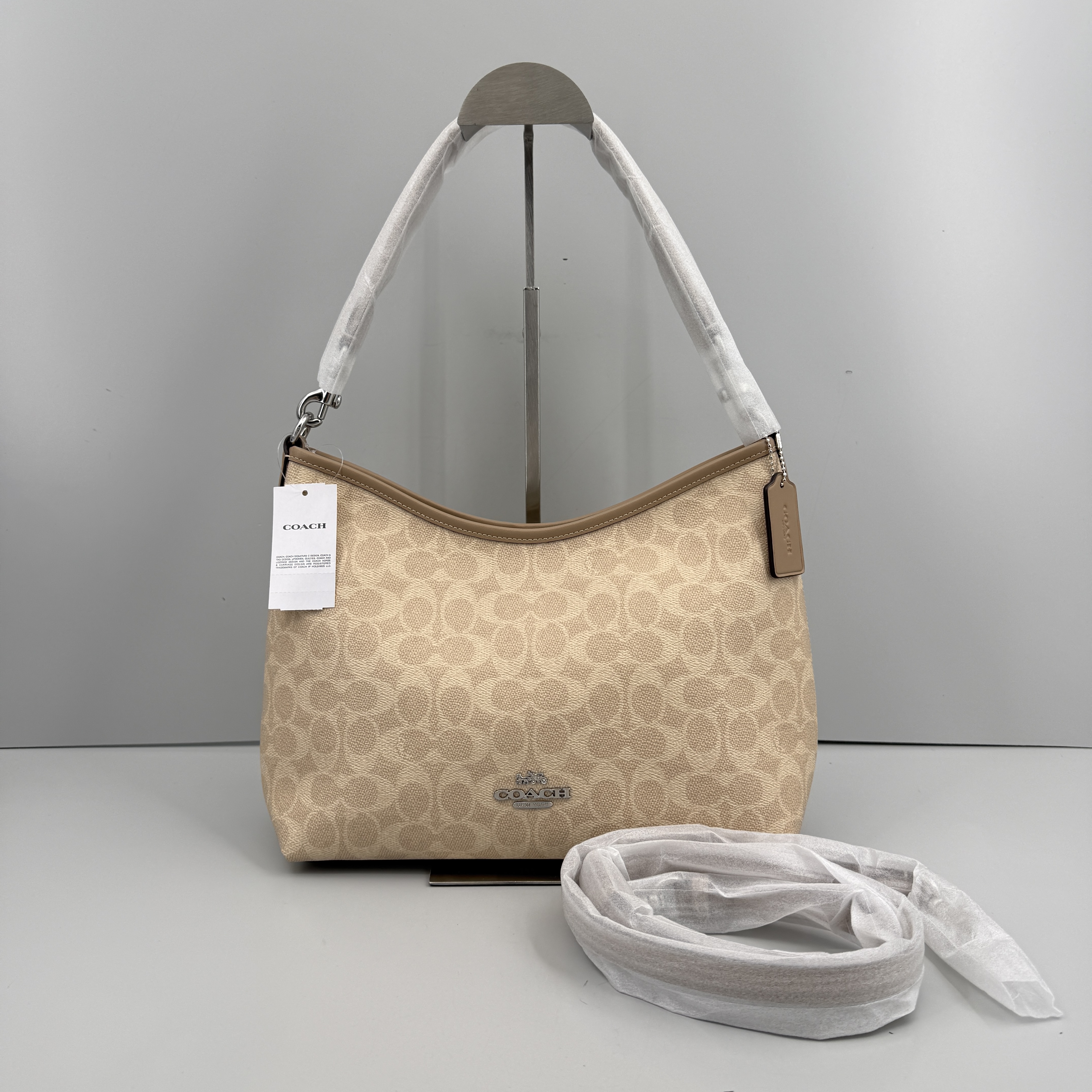 99新 COACH/蔻驰 laurel31沙色老花流浪包31*22*11cmM112501