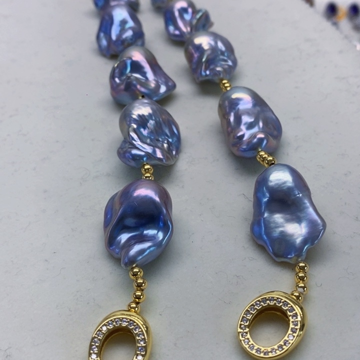 银S925镶嵌耳饰淡水珍珠阿****狗