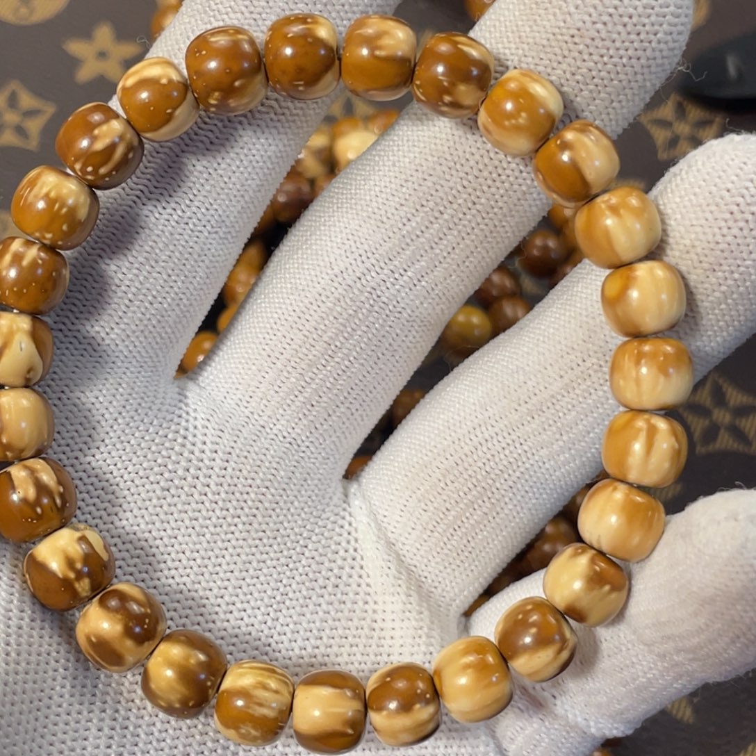 鹏***哥手串紫金鼠9×8实心老型合袋03