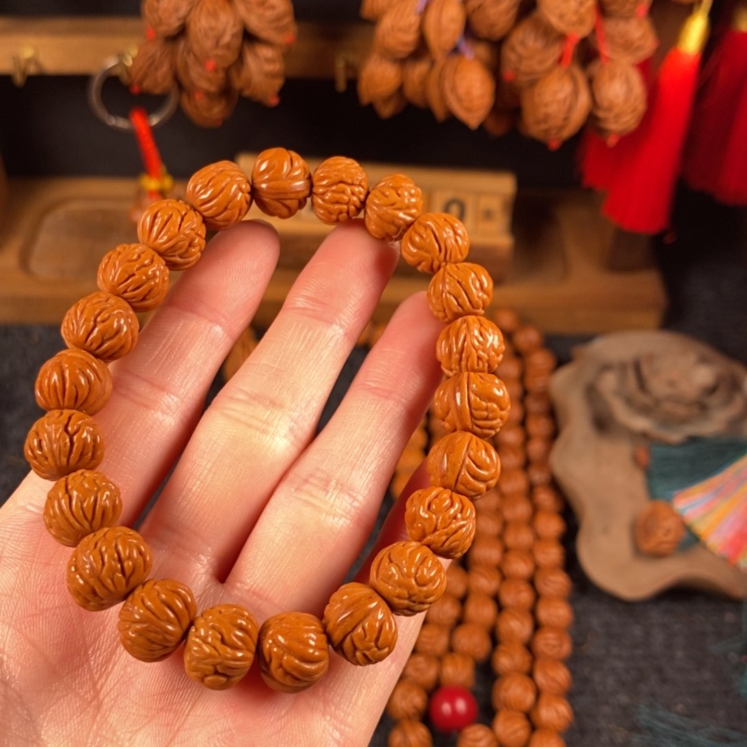 吊坠桃核桃枭手串